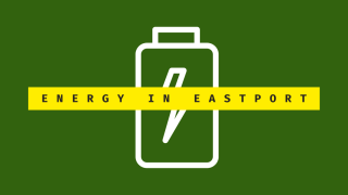 White outline of  a battery on a green background, with yellow text box reading Energy in Eastport